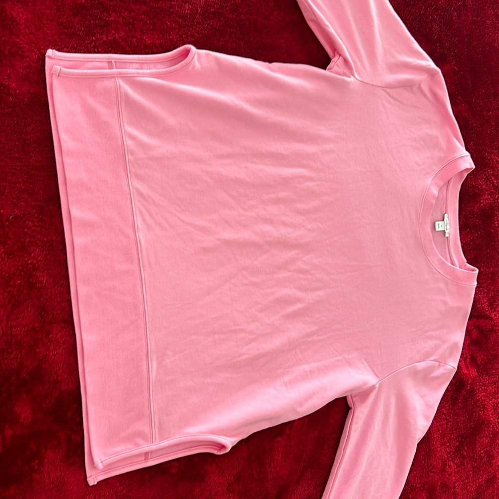Very soft sweatshirt material,Slits on both sides at bottom. Crew neck